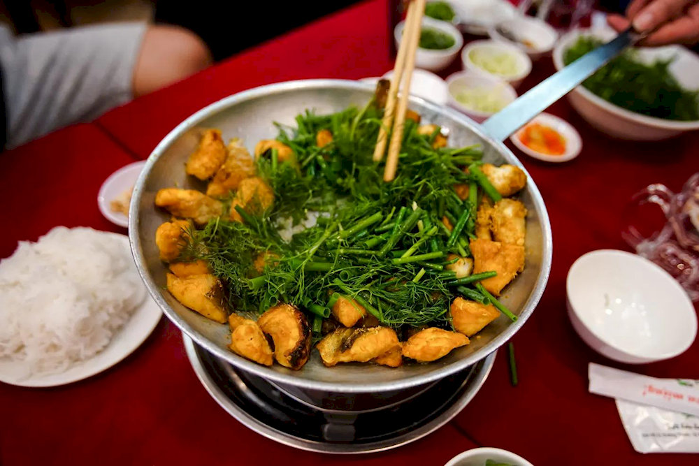 The Sydney Morning Herald recognized Cha Ca La Vong as a must-eat dish when visiting Vietnam